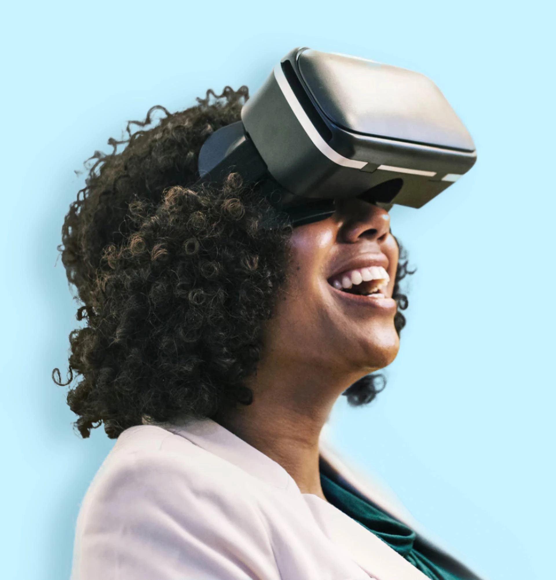 woman smiling while wearing virtual reality headset