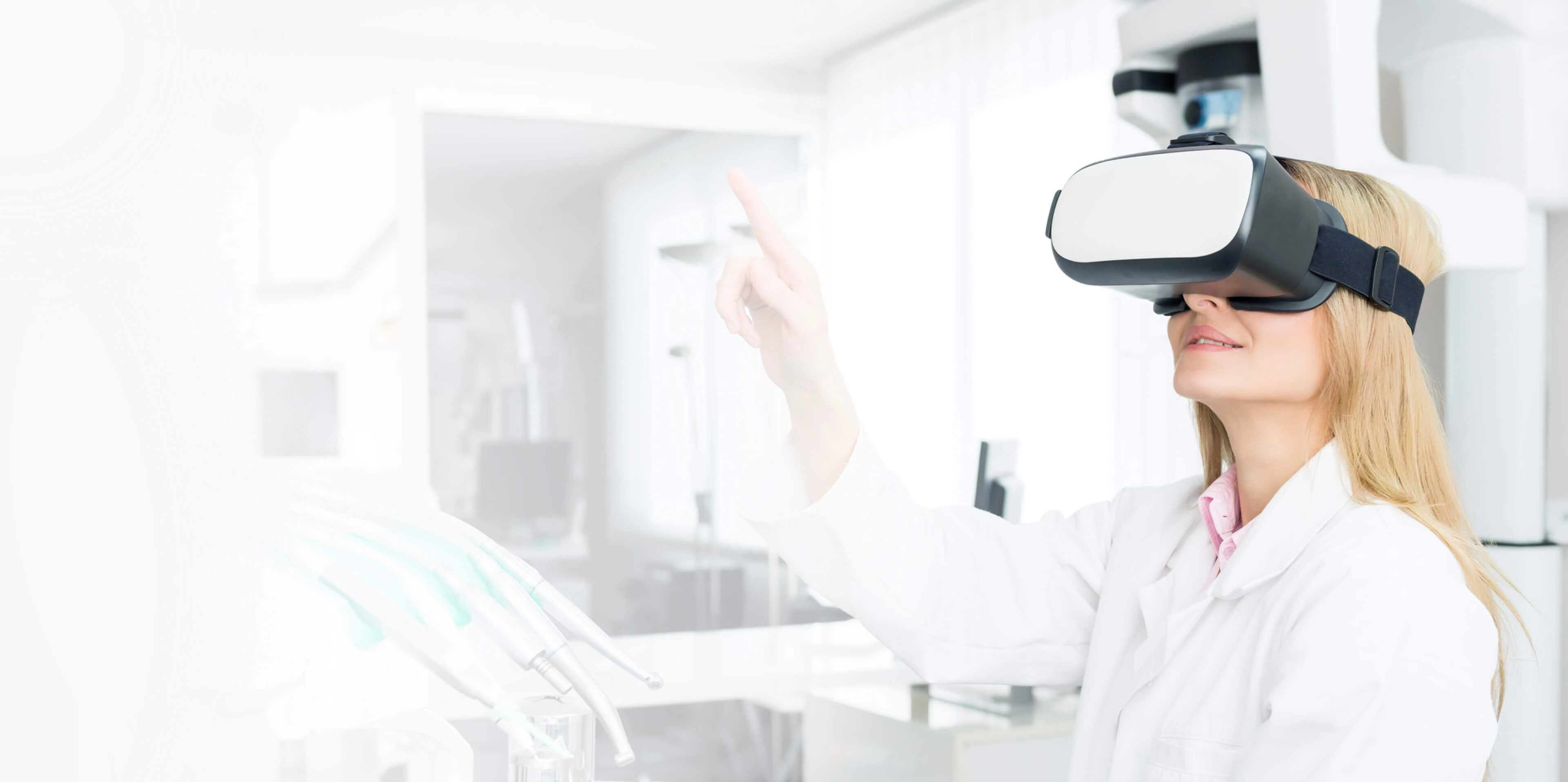 a woman wears VR glasses in the medical room